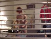 peeping on naked women through window